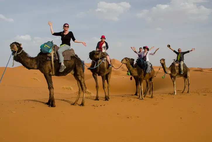 Camel riding in Sahara