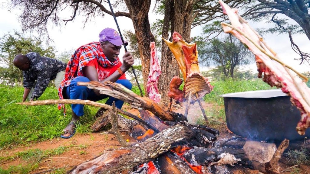 Maasai food culture. Meat roasting ongoing